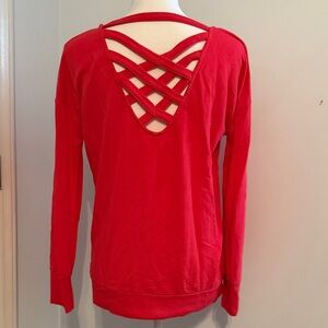 Coral sweatshirt with cute criss cross cutout in the back